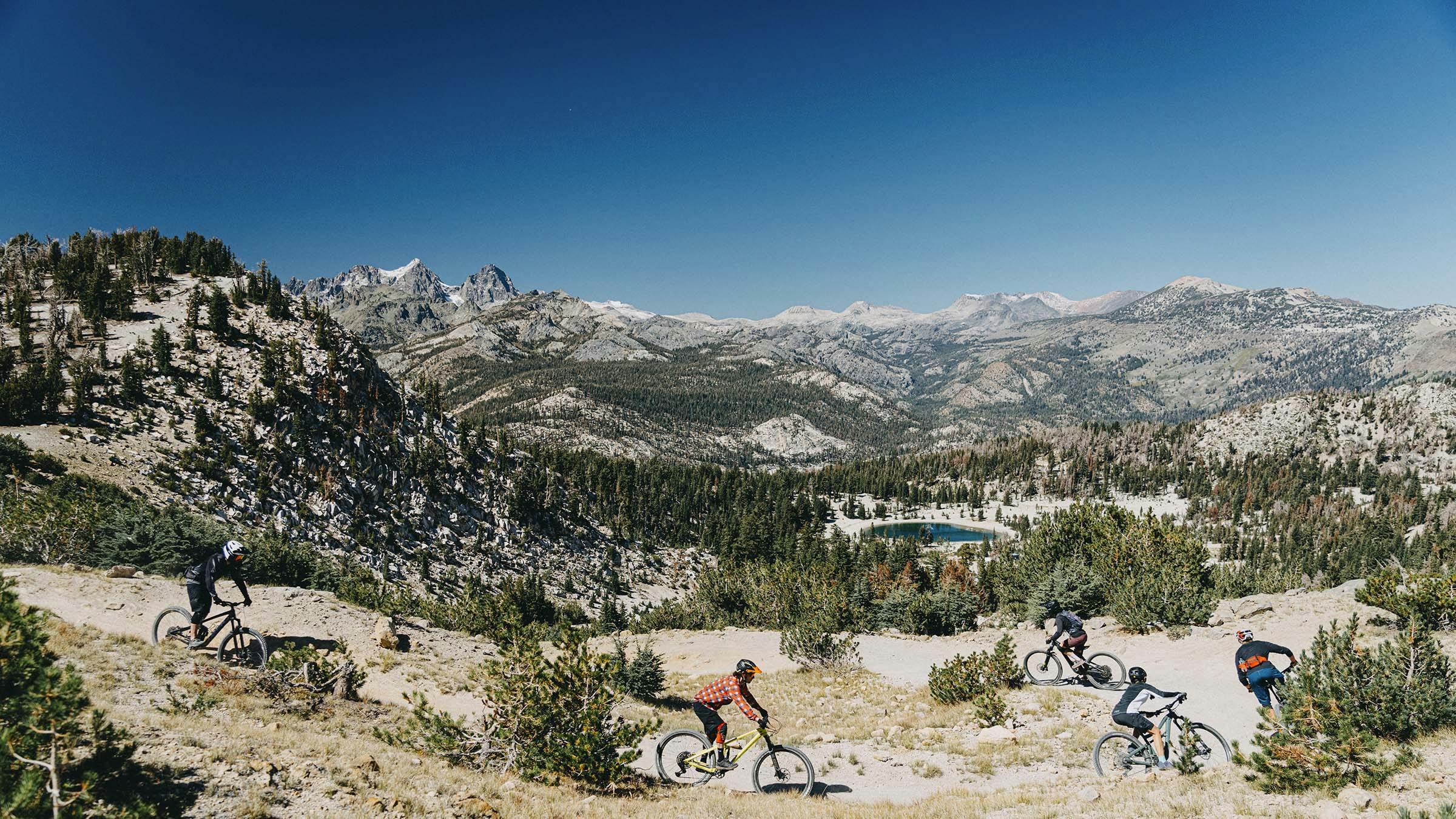 Mountain bikers riding down the Mammoth Bike Park trails