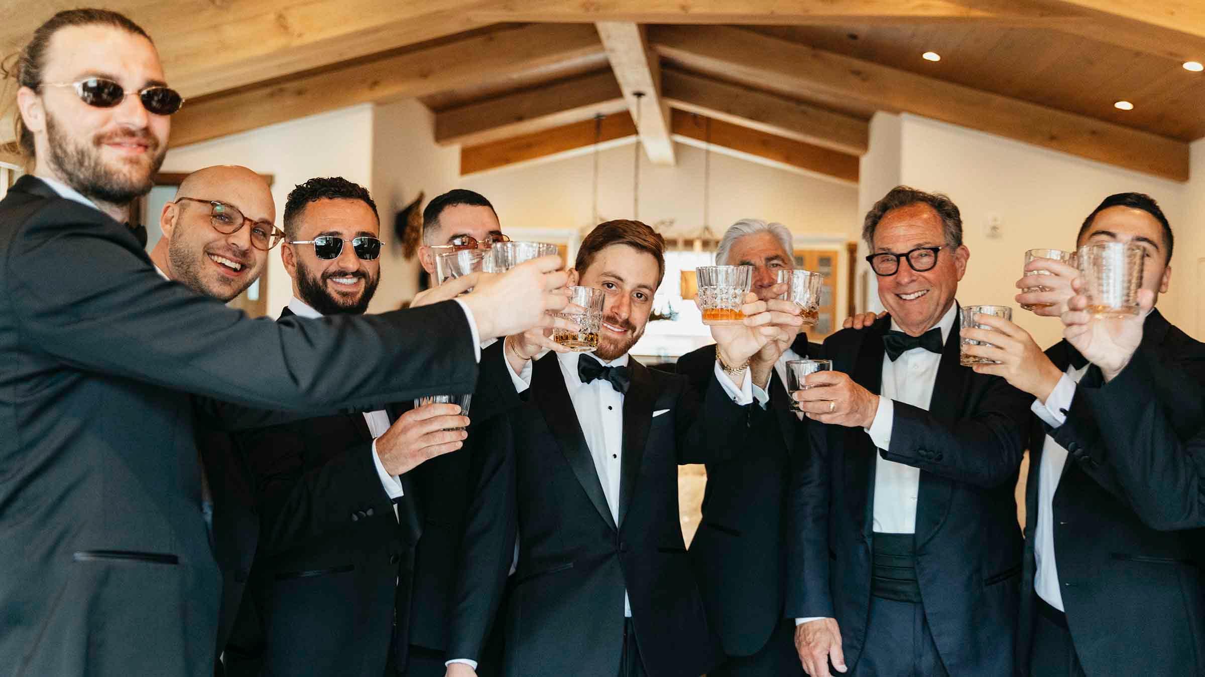 Groomsmen raising a glass