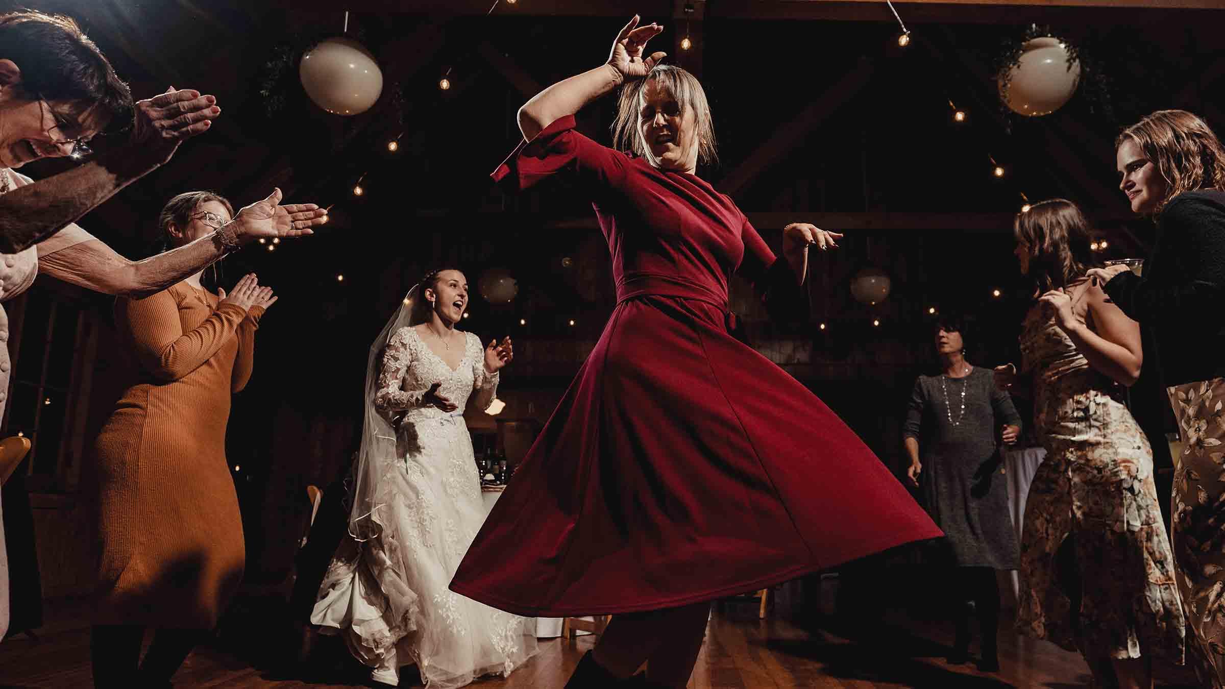 Woman dancing at a wedding reception