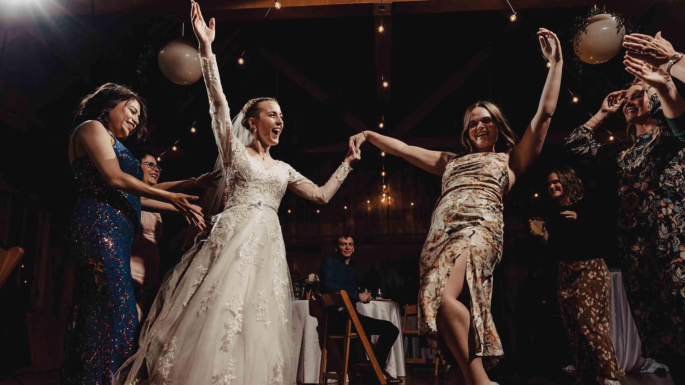 Bride and groom enter their wedding reception